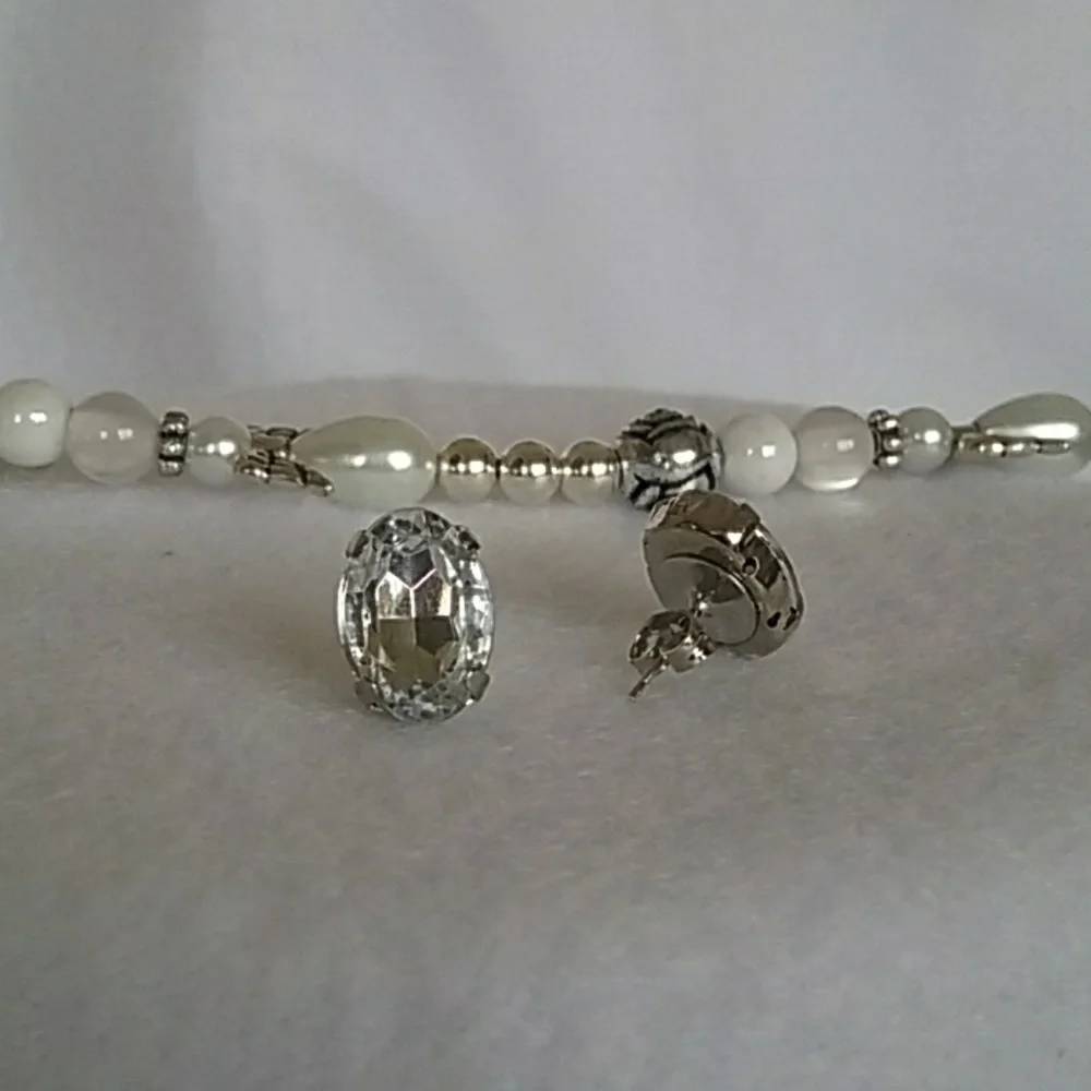 Rhinestone and silver post earrings
